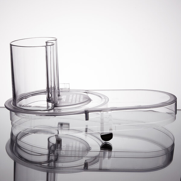 A clear plastic container with a clear tube on top.