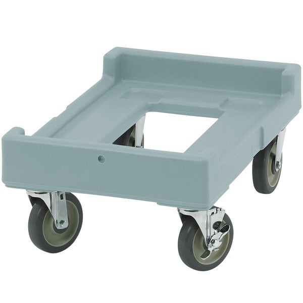 A slate blue plastic Cambro Camdolly with black wheels.