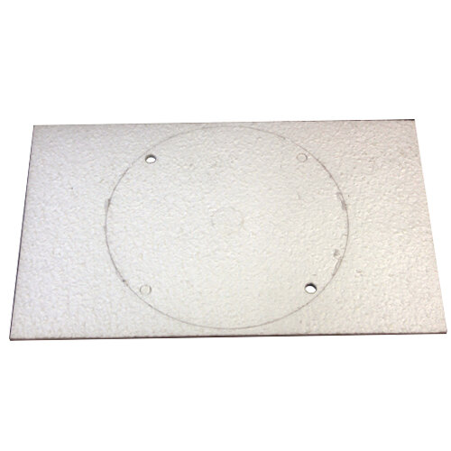 A white rectangular plastic pad with holes in it.