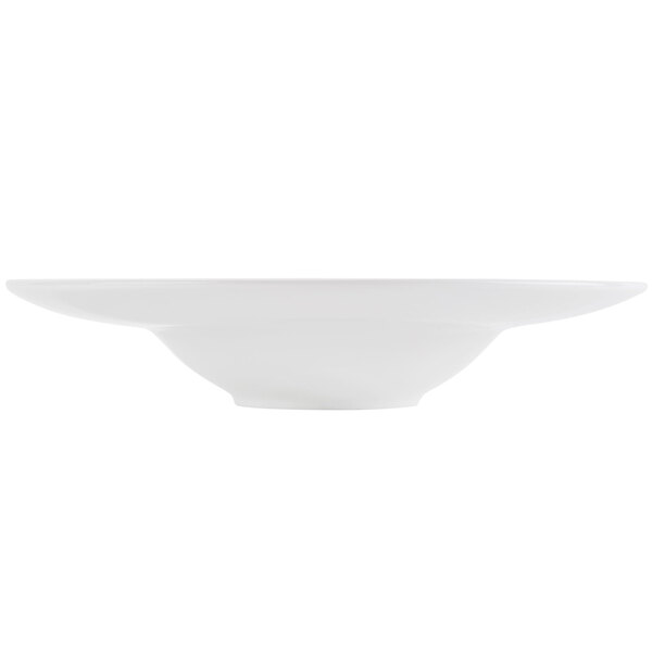 A CAC Paris bone white porcelain soup bowl with a white background.