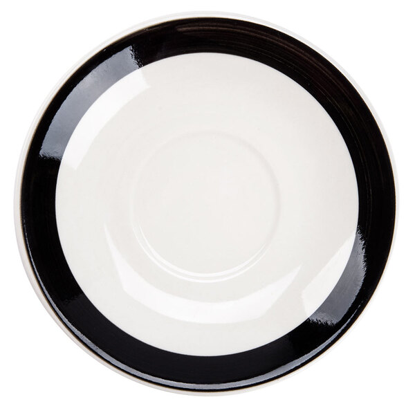 A black saucer with a circular edge.