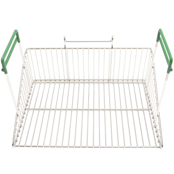 A wire basket with green handles for Frymaster chicken fryer.