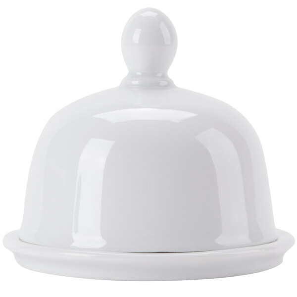 A bright white porcelain butter dish with a dome-shaped lid.