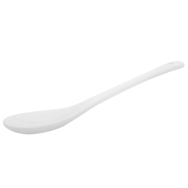 A bright white porcelain tasting spoon with a white handle.