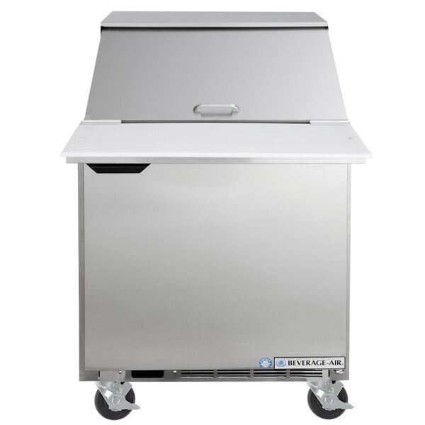 A silver stainless steel Beverage-Air refrigerator with a lid on wheels.