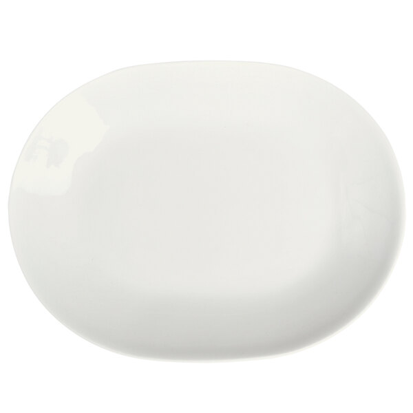 A Homer Laughlin bright white oval china platter with a curved edge.
