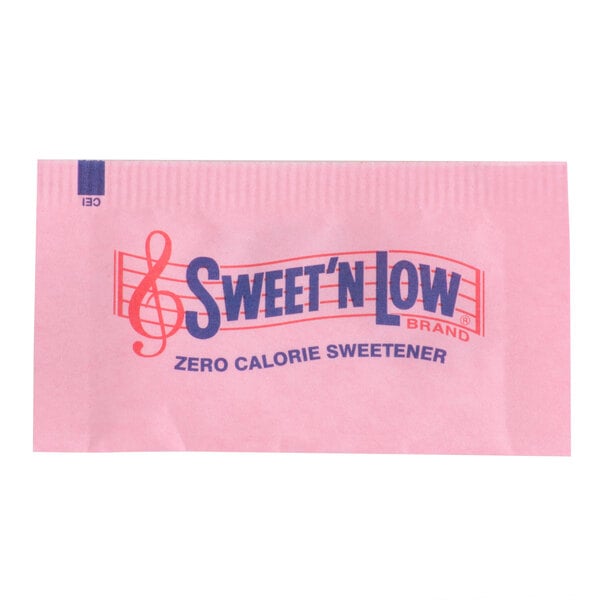 A close-up of a Sweet'N Low pink packet with blue text and a red line.