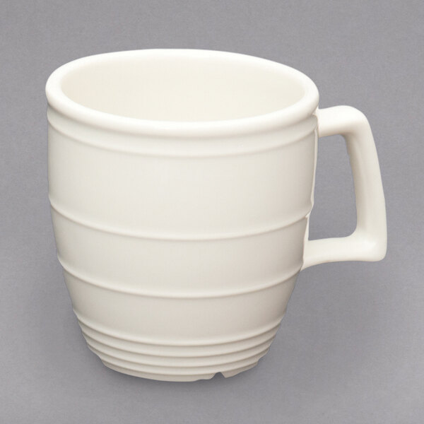 A white Homer Laughlin china mug with a handle.