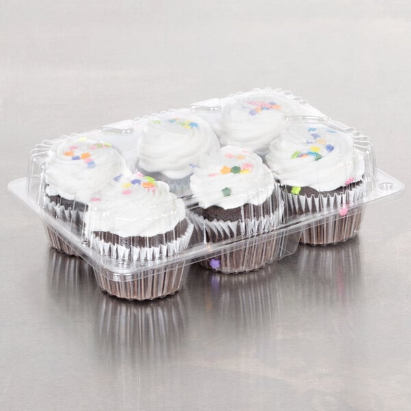 A Polar Pak clear plastic container with six cupcakes with frosting and sprinkles.