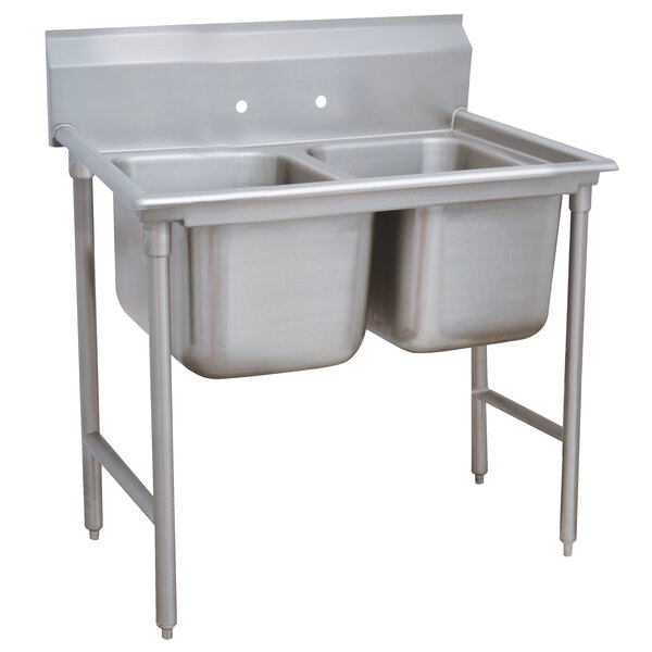 A stainless steel Advance Tabco two compartment pot sink with two bowls.