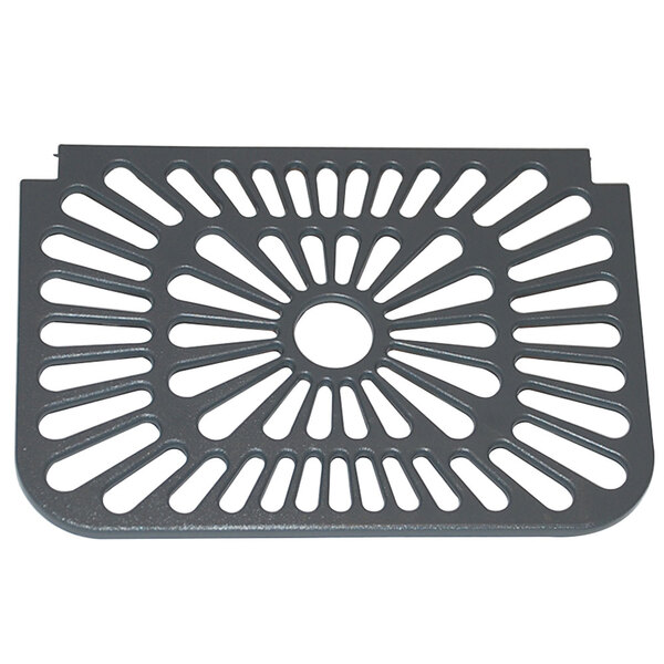 A grey metal grate with a circular design and holes.
