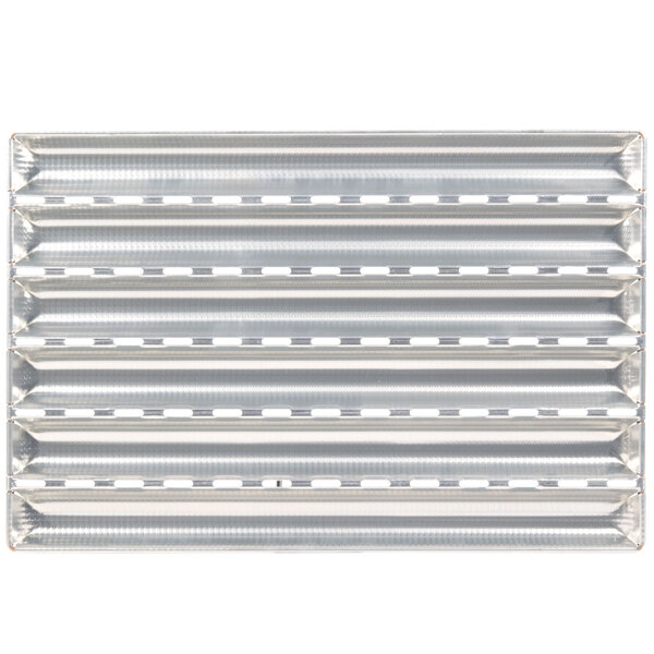 A Matfer Bourgeat baguette pan with six compartments on a metal surface.