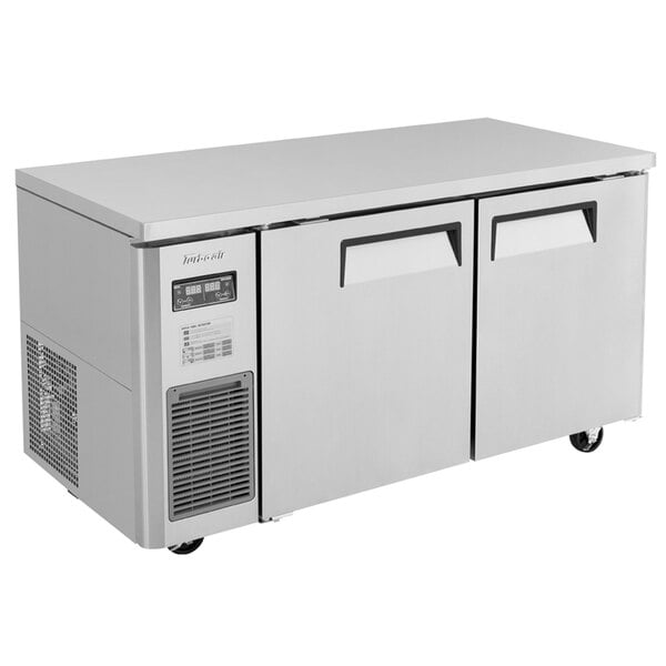 A stainless steel Turbo Air undercounter refrigerator and freezer with two doors.