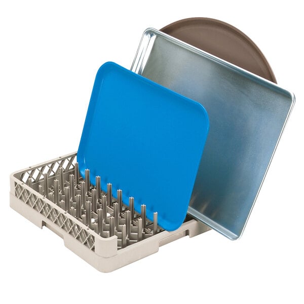 A Vollrath Traex dish rack with a beige tray inside.