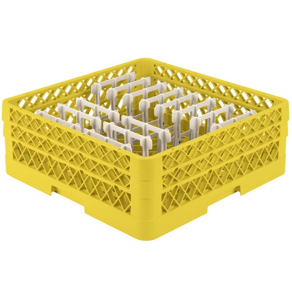 A yellow plastic Vollrath Traex dish rack with four compartments.