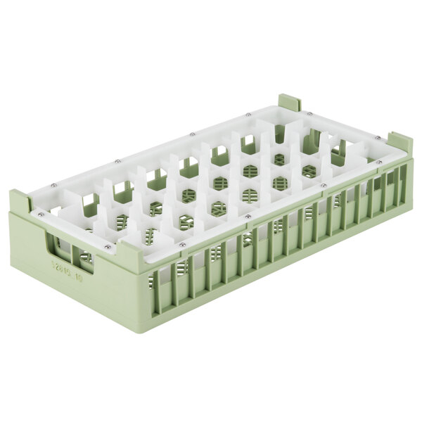 A white and green plastic Vollrath rack with 32 compartments.