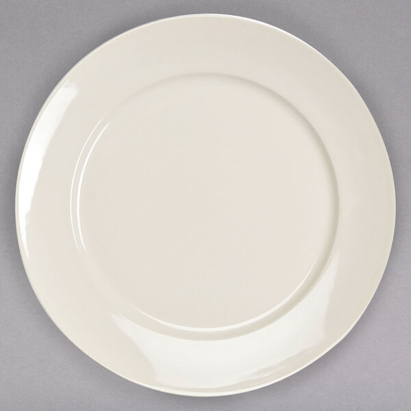A Homer Laughlin ivory china plate on a gray surface.