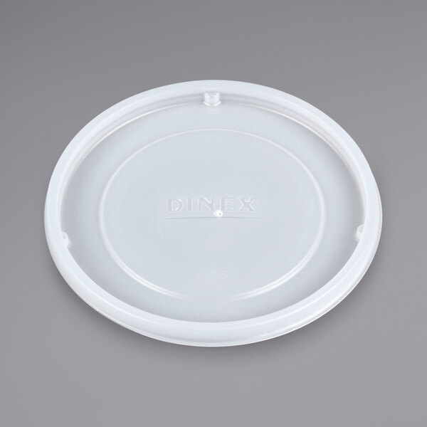 A white plastic lid with the Dinex logo.