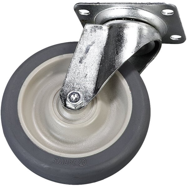 A Carlisle grey swivel plate caster with a metal wheel and rubber tire.