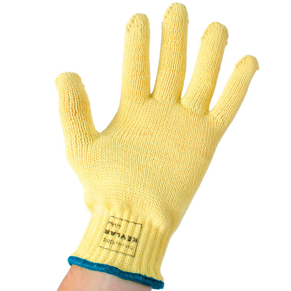 A yellow Cordova cut resistant glove with a blue wristband.