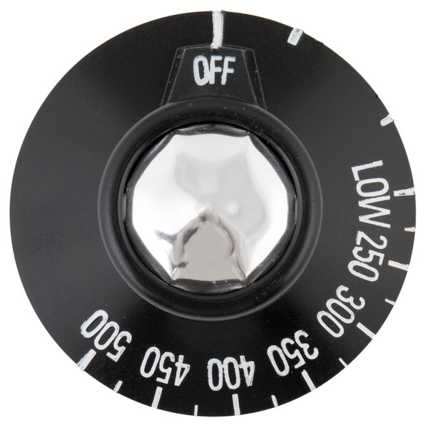 A black oven temperature knob with white text.