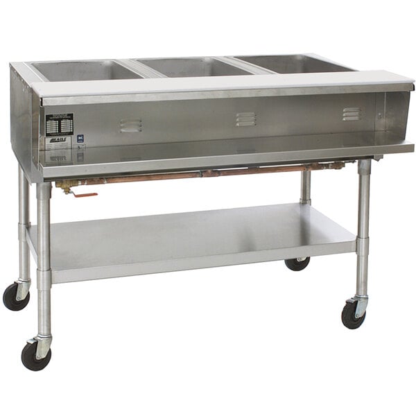 A large stainless steel Eagle Group commercial steam table with three sealed wells.