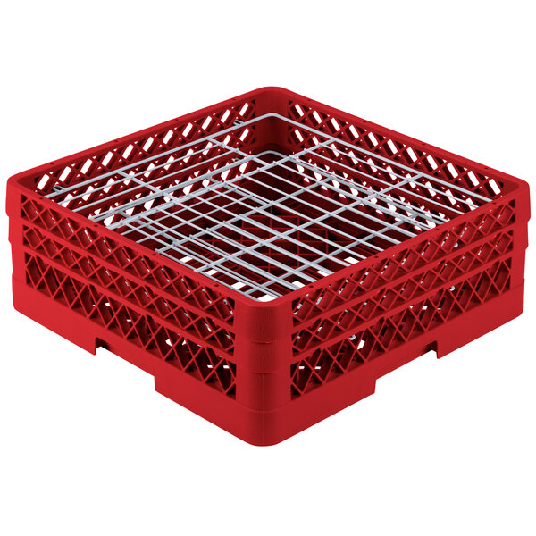 A red Vollrath Traex Plate Crate dish rack with metal dividers.