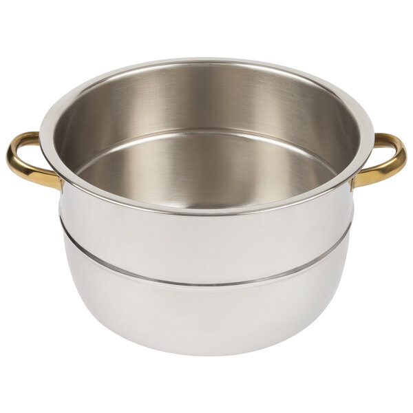 A silver pot with gold handles.