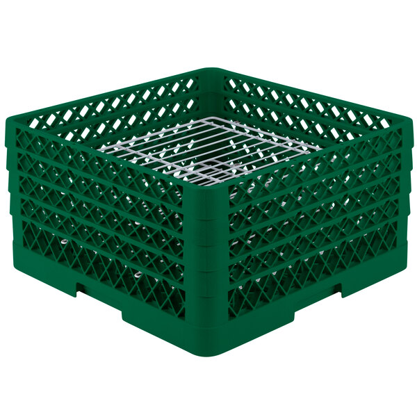 A green plastic Vollrath Traex Plate Crate with white metal dividers.