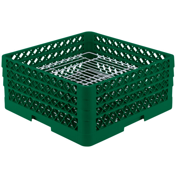 A green plastic basket with white metal grate holding plates.