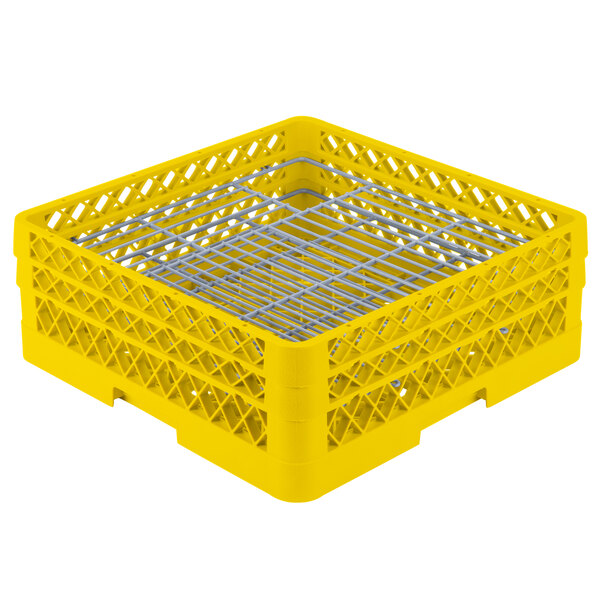 A yellow plastic Vollrath Traex Plate Crate with metal bars.