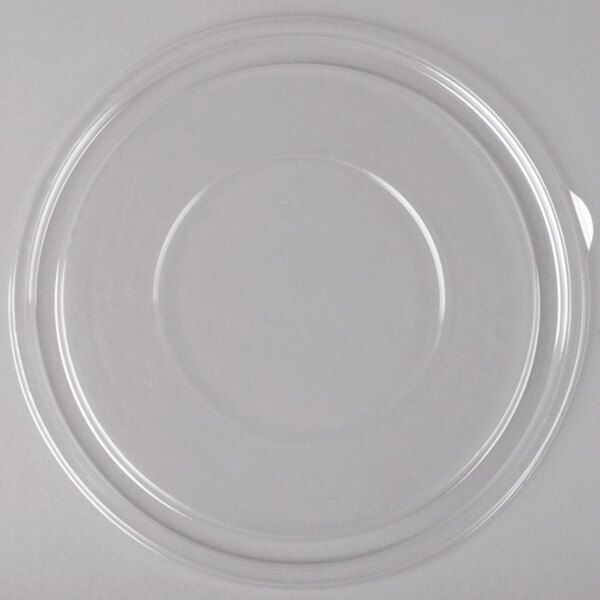 A clear plastic lid with a round rim.