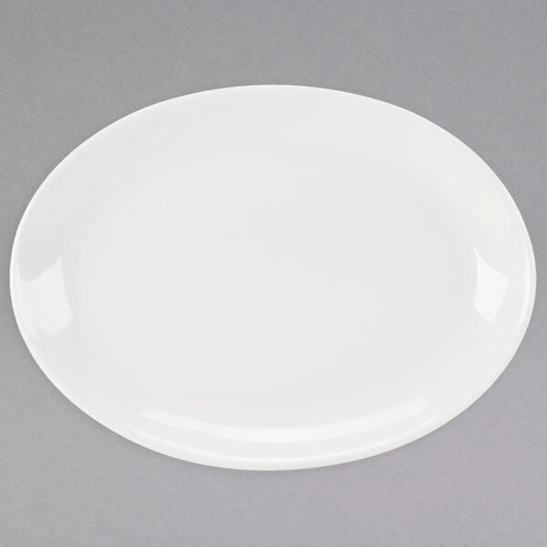 A white oval Homer Laughlin China platter with a white rim.