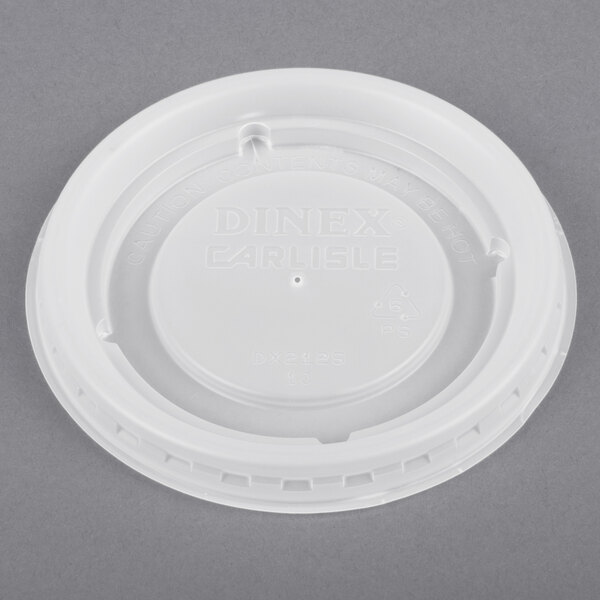 A white Dinex plastic lid with a translucent lid on it.