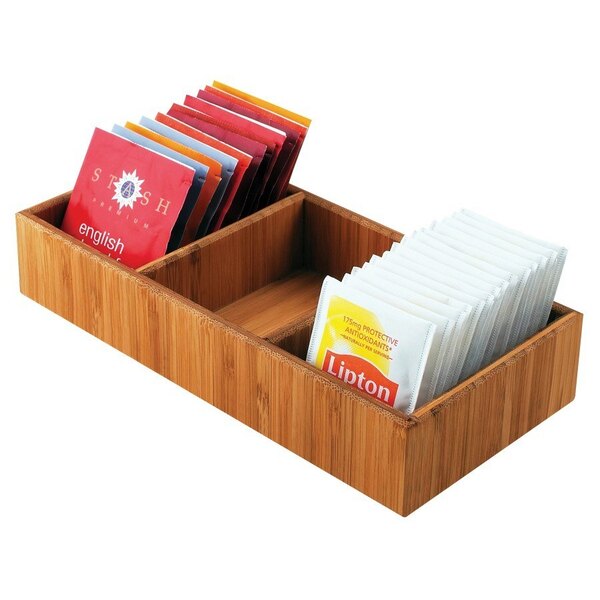 A wooden container with tea bags in a Cal-Mil bamboo organizer.