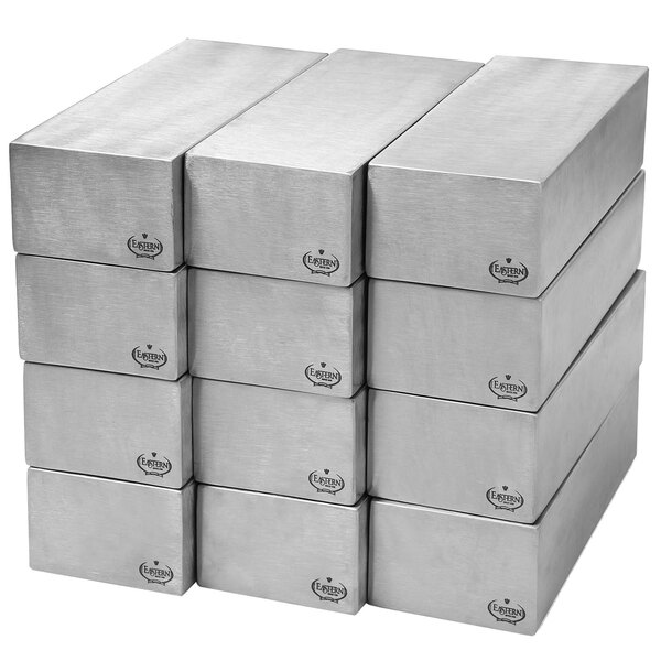 A stack of Eastern Tabletop stainless steel magnetic block risers.