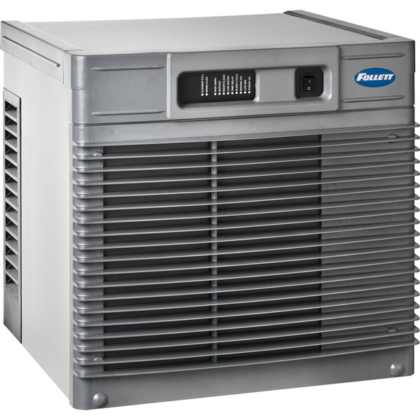 A grey rectangular Follett water cooled ice machine with a vent.