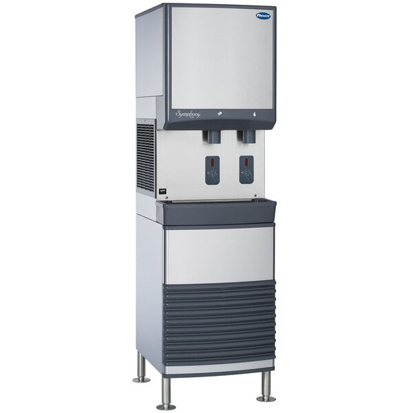A large grey Follett ice and water dispenser with a black and grey cover.