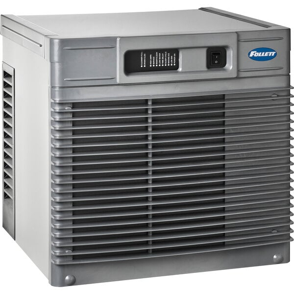 A grey rectangular air cooled Follett ice machine with a vent.