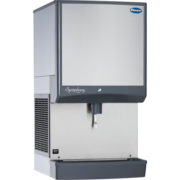 A large silver rectangular Follett countertop ice maker / dispenser with a stainless steel finish.