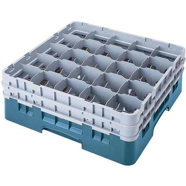 A teal plastic Cambro glass rack with 25 compartments and extenders.