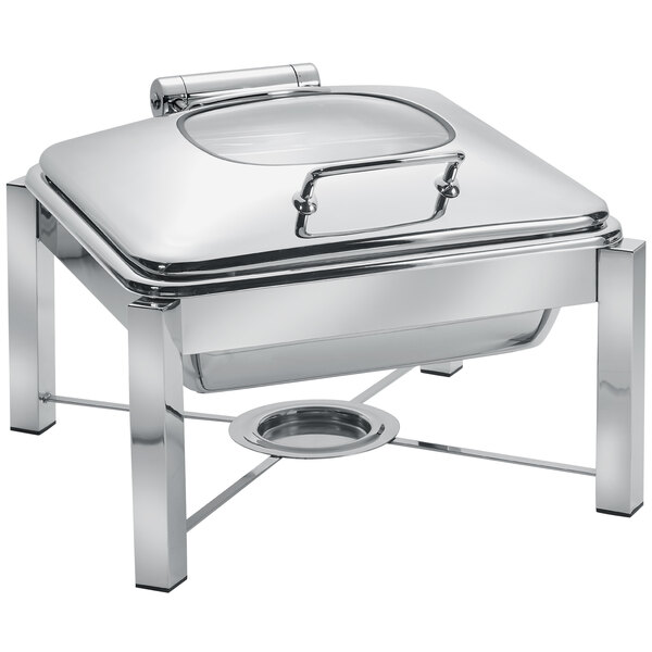 An Eastern Tabletop stainless steel square chafer with glass lid on a stand.