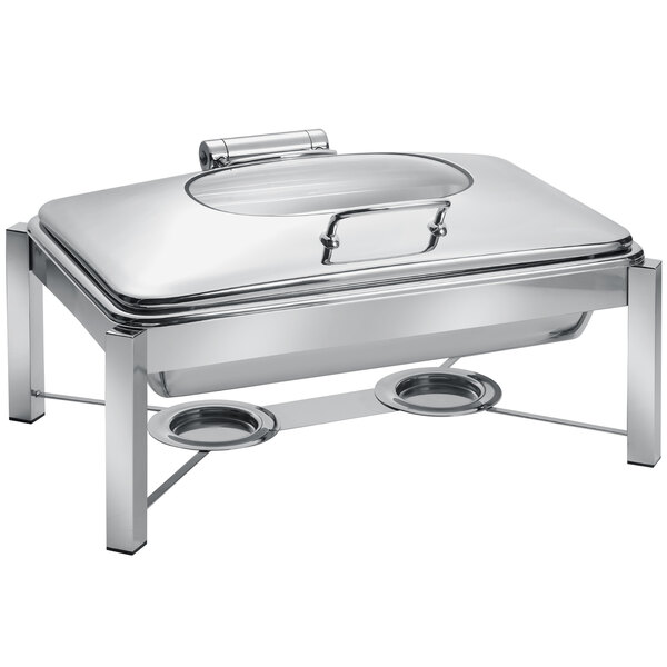 An Eastern Tabletop rectangular stainless steel chafer with a hinged glass dome lid on a stand.