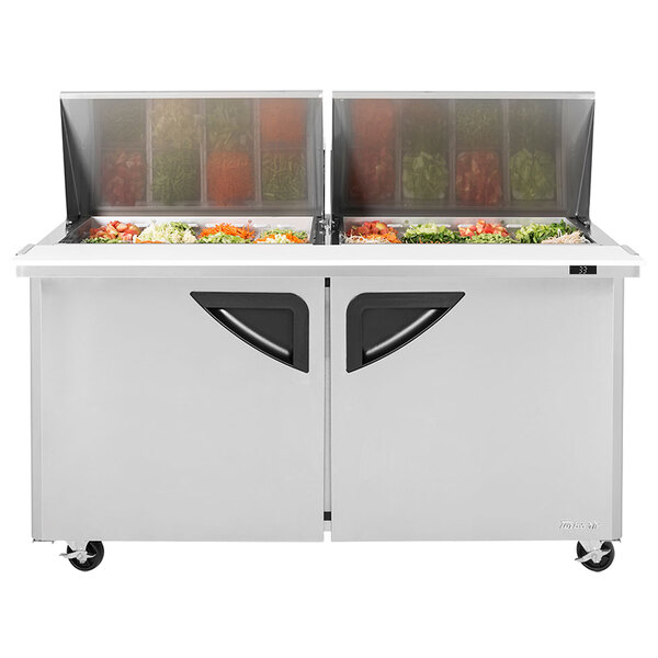 A Turbo Air refrigerated sandwich prep table with vegetables in containers.