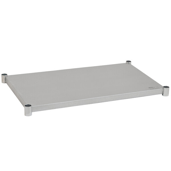A white rectangular metal shelf with black handles attached to metal legs.