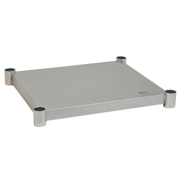 A galvanized metal undershelf with adjustable metal rods for an Eagle Group work table.