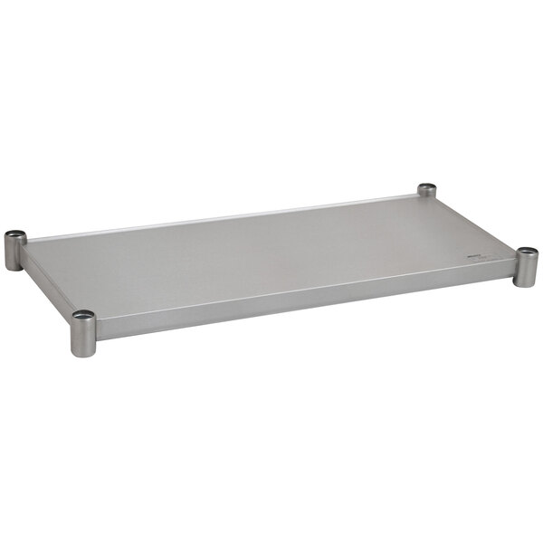 A silver rectangular stainless steel undershelf with metal legs.