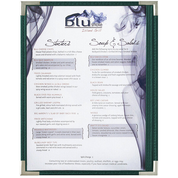 A Royal Menu Solutions green menu board with silver corners on a restaurant counter.
