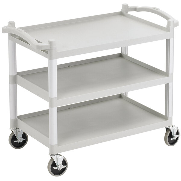 A white Cambro low profile utility cart with black wheels.