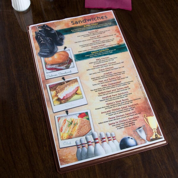 A Menu Solutions chocolate menu board on a table.